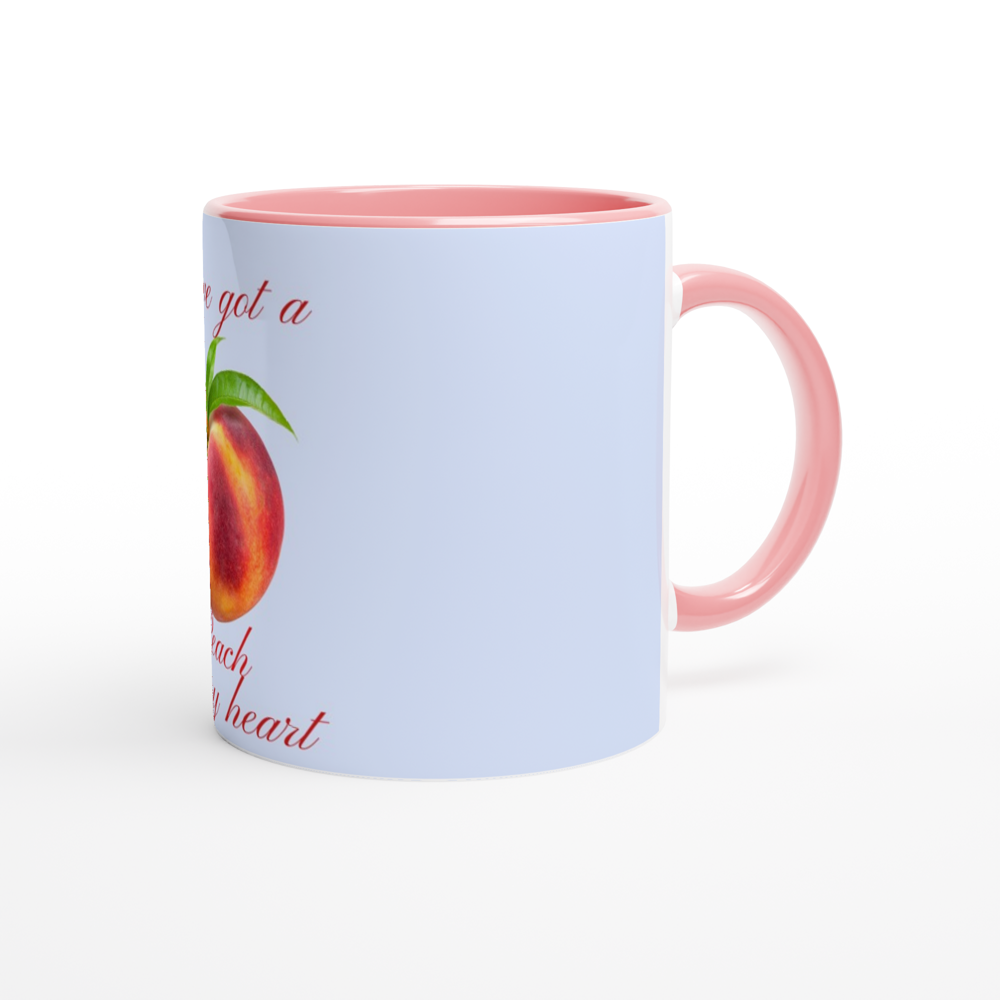 White 11oz Ceramic Peach Mug with Color Inside.