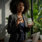Woman holding a bottle of supplements with text about Ashwagandha and stress management.