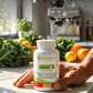Knockout Men's multivitamin bottle on a kitchen counter with text about plant-based edge for men.