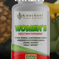 Knockout Power Nutrition Women's Daily Multivitamin bottle with green leaves and pineapple in the background