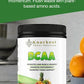 Knockout Power Nutrition BCAA supplement container on a kitchen counter with oranges in the background.