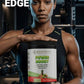Person holding a supplement container labeled 'Power Boost' in a gym setting