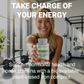 Woman holding a supplement bottle with gym equipment in the background